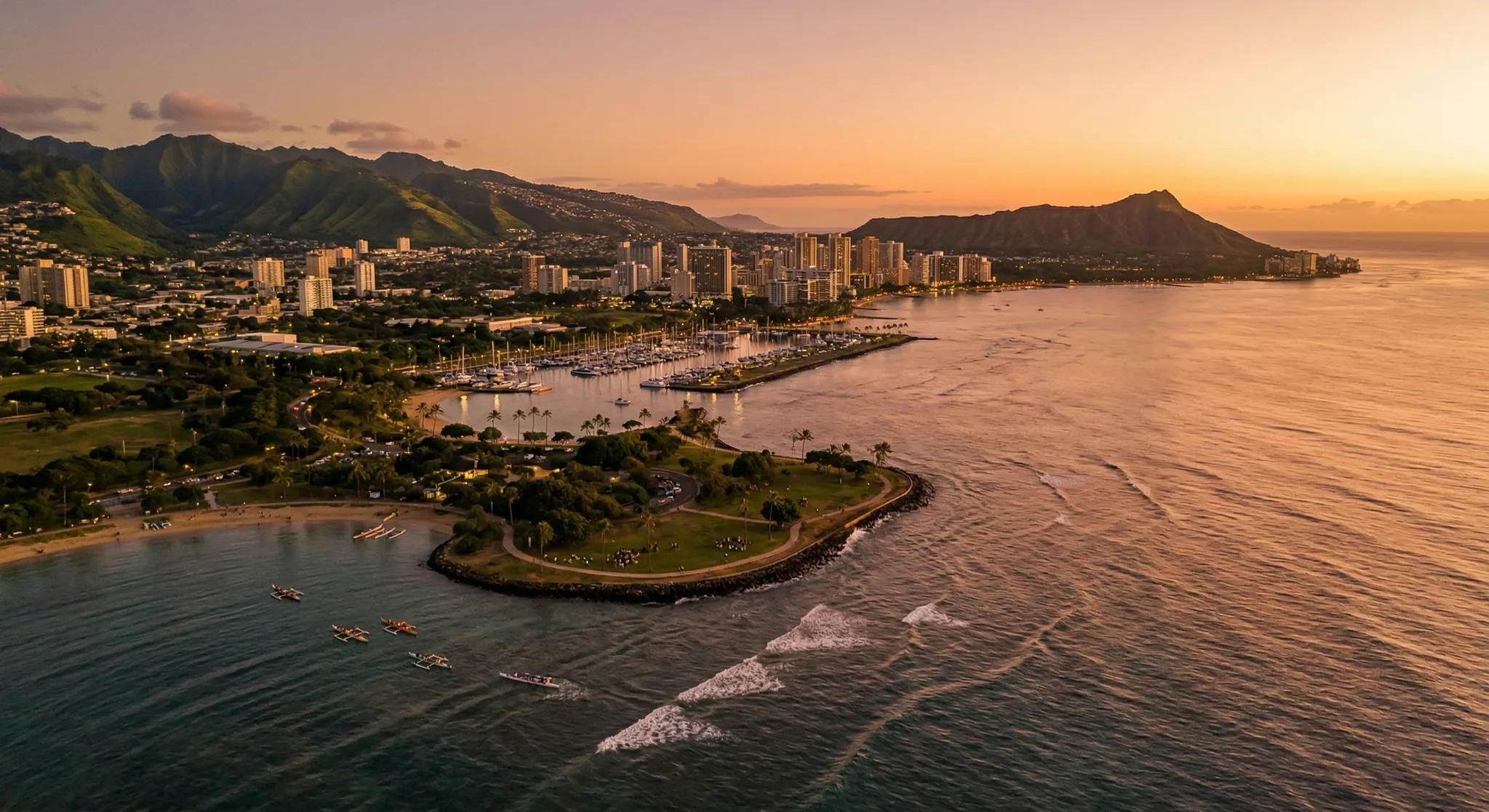 Aerial view of Honolulu coastline at golden hour